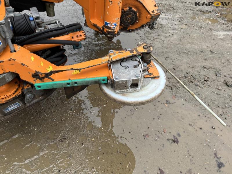 New Holland T6.150 tractor with Mulac arm mower 58