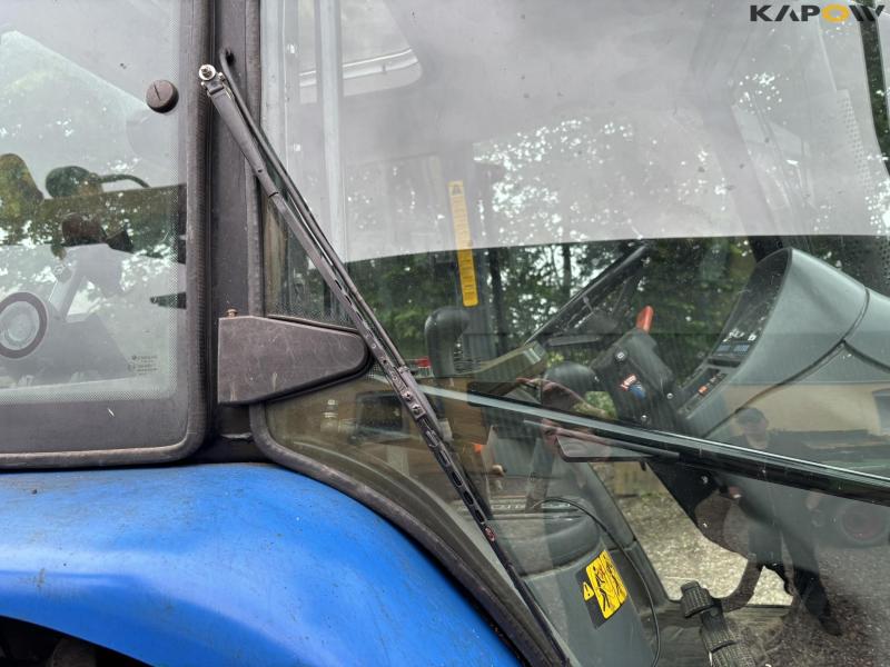 New Holland TS 115 with Bomford arm mower 21