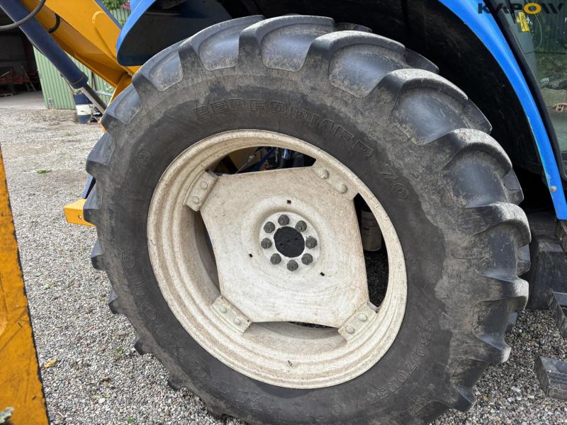 New Holland TS 115 with Bomford arm mower 22