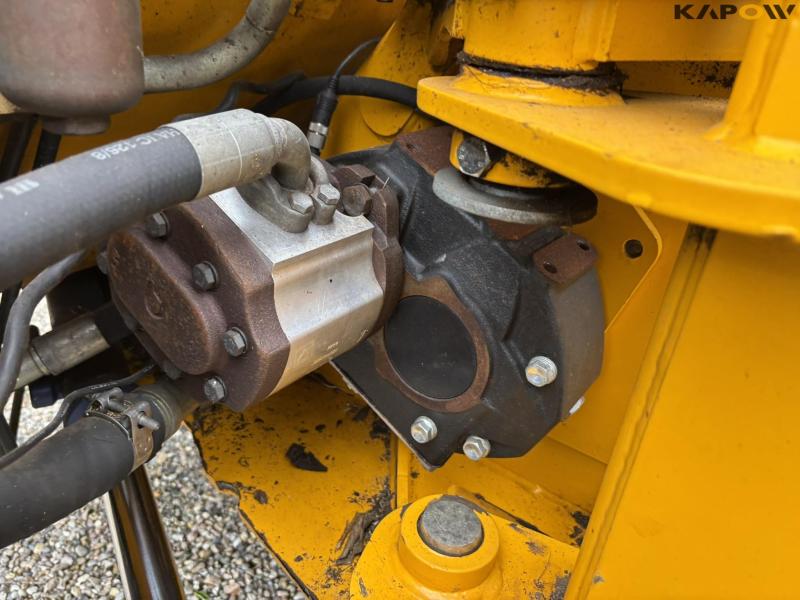 New Holland TS 115 with Bomford arm mower 63