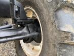 New Holland TS 115 with Bomford arm mower 10