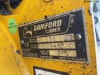 New Holland TS 115 with Bomford arm mower 101