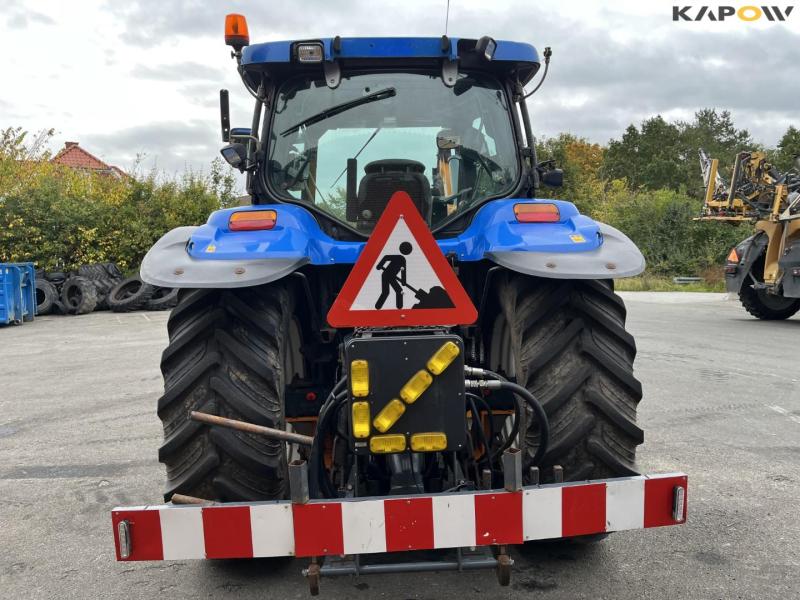 New Holland TS135A tractor with Epoke arm mower 6