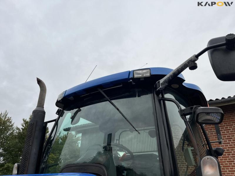 New Holland TS135A tractor with Epoke arm mower 12