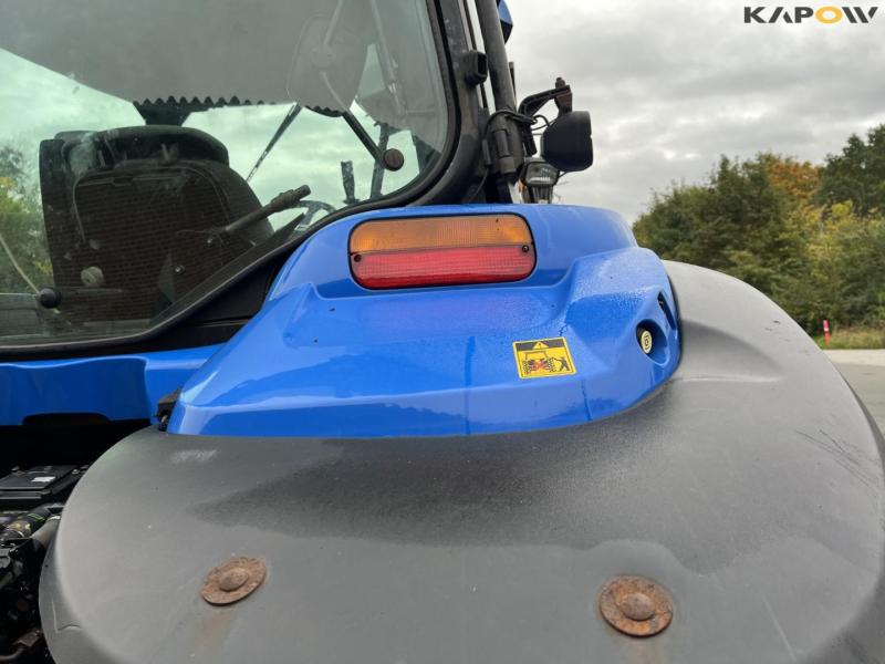 New Holland TS135A tractor with Epoke arm mower 23