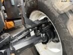 New Holland TS135A tractor with Epoke arm mower 15