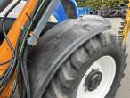 New Holland TS135A tractor with Epoke arm mower 19