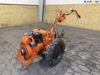 Nibbi tool carrier with plow