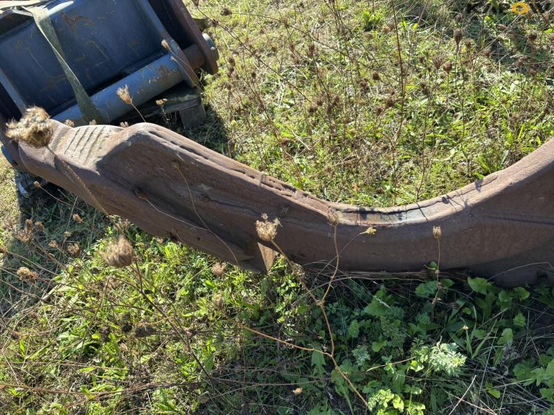 Grader bucket and digging tooth 26
