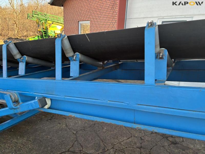 Record swing kart conveyor belt 38