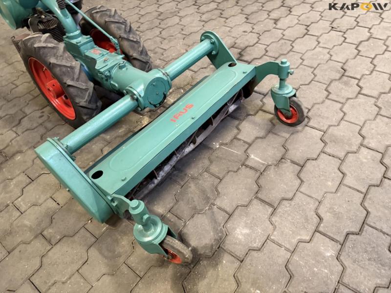 Tool carrier with cylinder mower 11