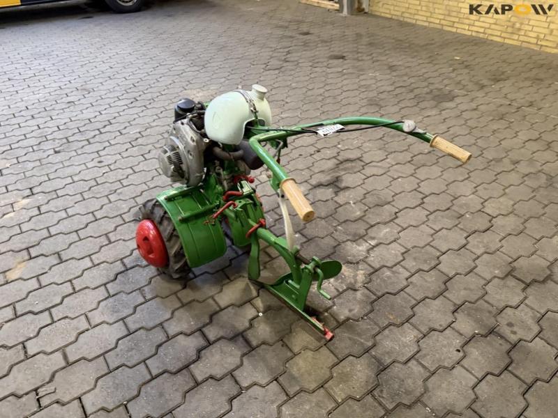 Tool carrier with plow 7