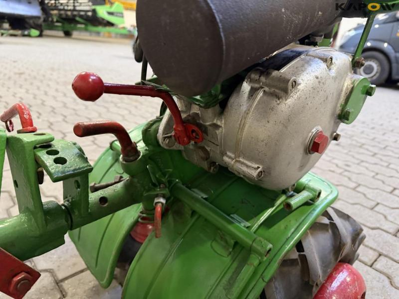 Tool carrier with plow 11