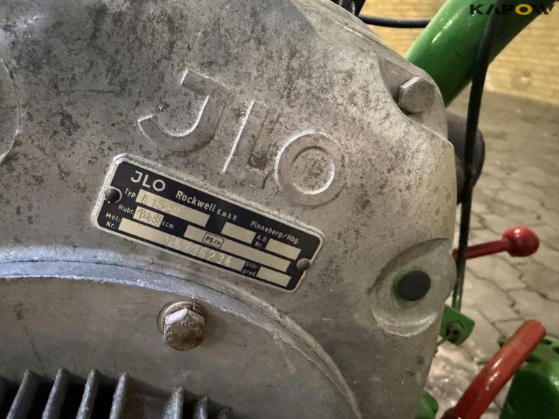 Tool carrier with plow 26