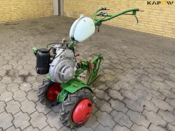 Tool carrier with plow