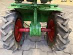 Tool carrier with plow 23