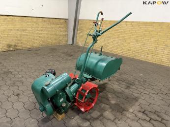 Tool carrier with spring cutter