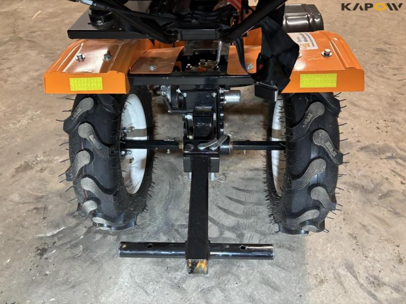 Tool carrier with tiller 25