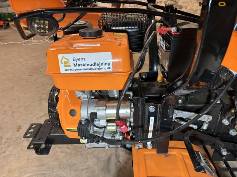 Tool carrier with tiller 36