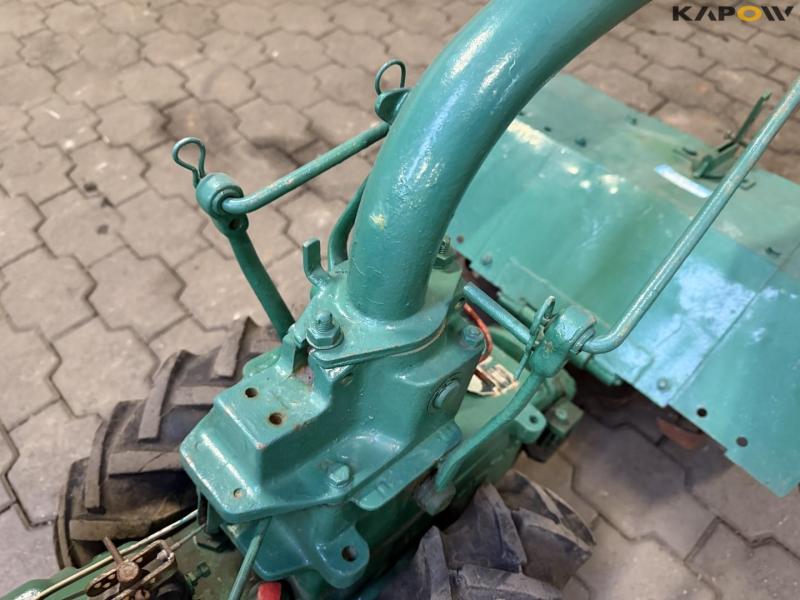 Tool carrier with milling cutter 21