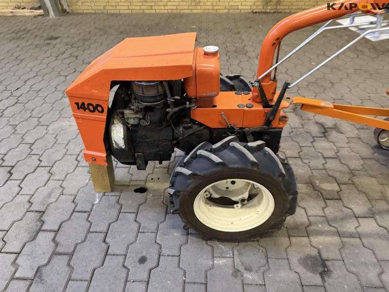 Tool carrier with harrow 9