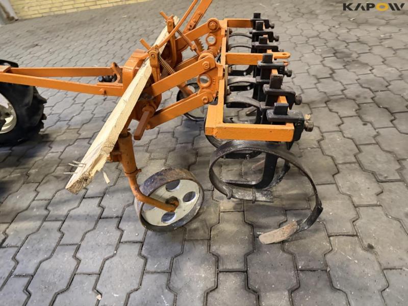 Tool carrier with harrow 41