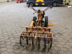 Tool carrier with harrow 6