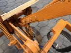 Tool carrier with harrow 44