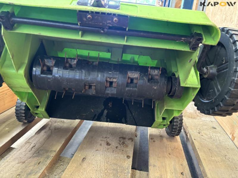 Seed wagon and lawn aerator 8