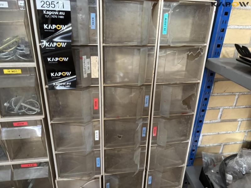 Assortment shelf with contents 37