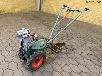 The Farmers Boy tool carrier with plow