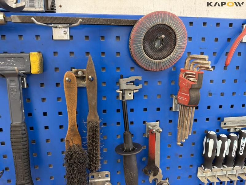 Workshop table with tools and blackboard 11