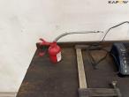 Tool table with tools + wall cable reel 17