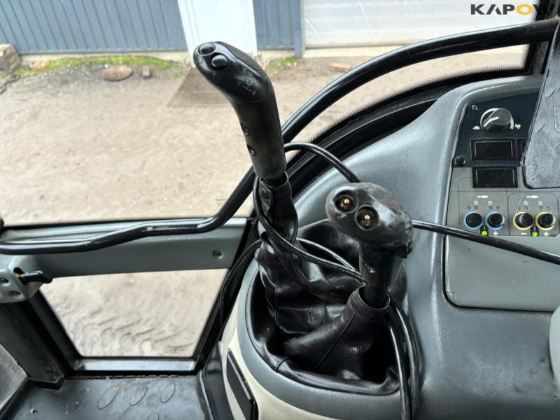 Valtra T150 tractor with front loader 56