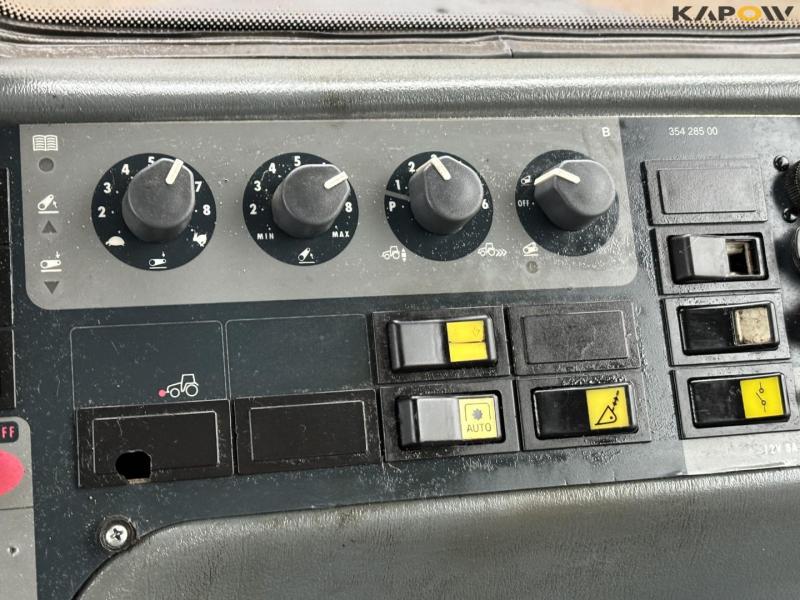 Valtra T150 tractor with front loader 65