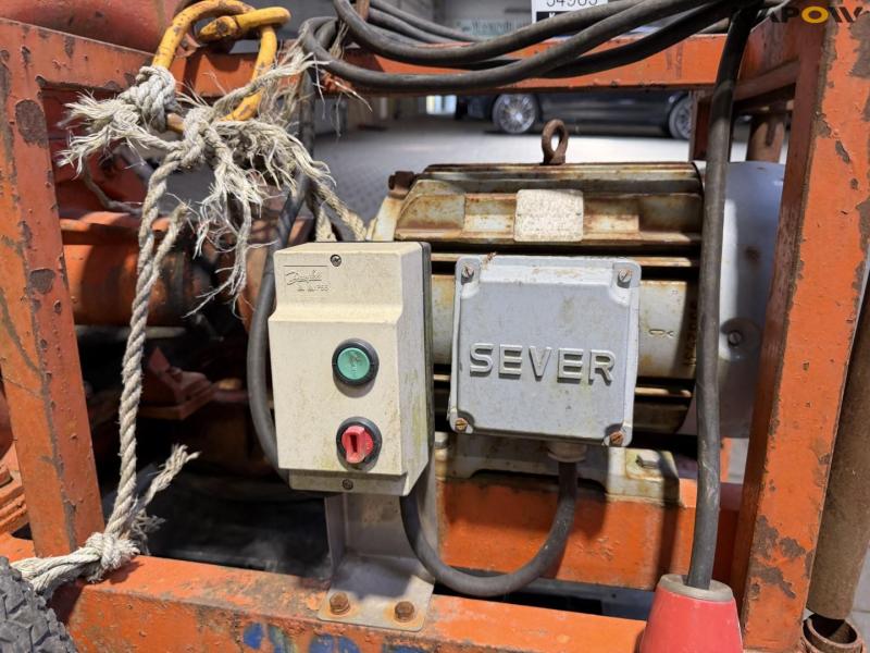 Water/sludge pump 23
