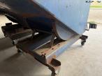 Tilting container 9
