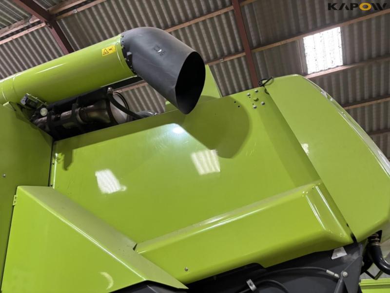 Claas 670 mejetærsker med V900 30fod skærebord 65