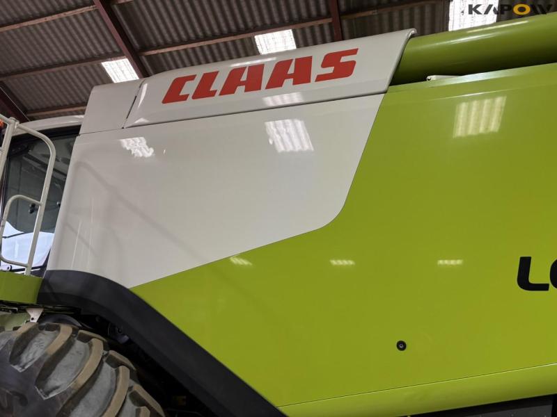 Claas 670 mejetærsker med V900 30fod skærebord 76