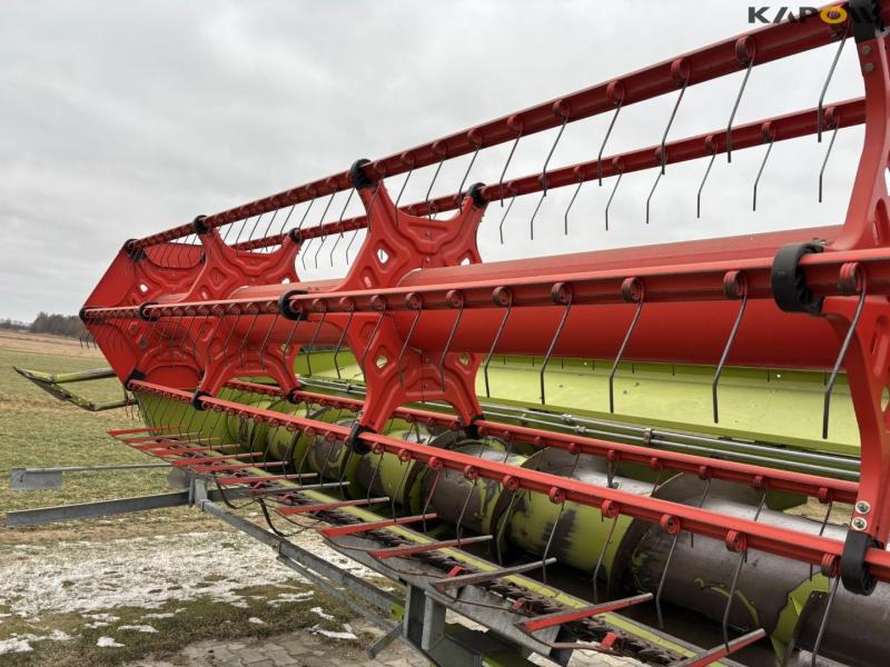 Claas 670 mejetærsker med V900 30fod skærebord 113
