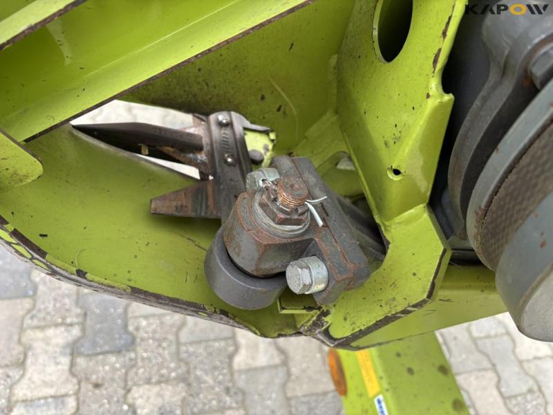 Claas 670 mejetærsker med V900 30fod skærebord 130