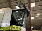 Claas 670 mejetærsker med V900 30fod skærebord 24