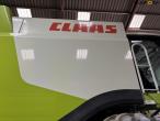 Claas 670 mejetærsker med V900 30fod skærebord 28