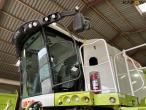Claas 670 mejetærsker med V900 30fod skærebord 85