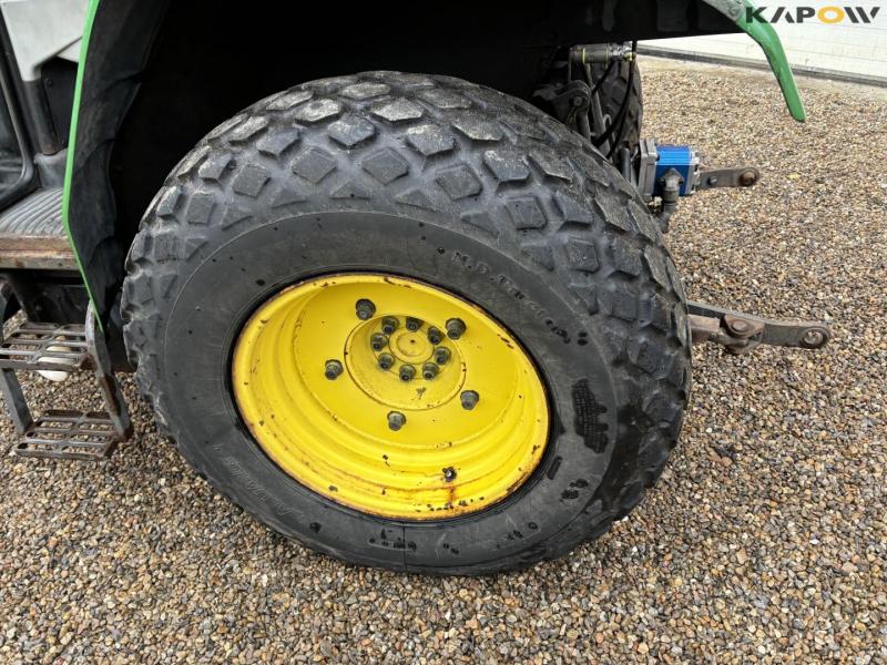 John Deere 3200 traktor med kost 69