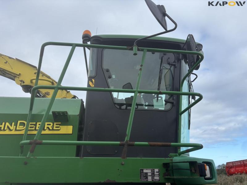John Deere 7700 snitter med majsbord og pickup 32