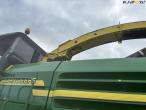 John Deere 7700 snitter med majsbord og pickup 52