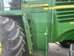 John Deere 7700 snitter med majsbord og pickup 55