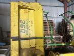 John Deere 7700 snitter med majsbord og pickup 96