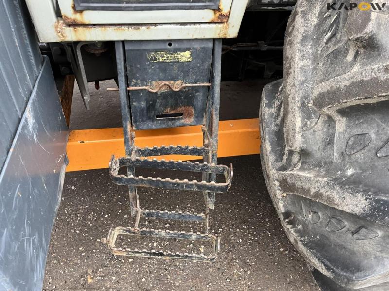 Massey Ferguson 390 traktor med armklipper 10